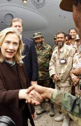 Clinton Travels to Libya with A Vow of U.S. Support 