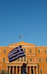 Greek Law Approves Civil Servant Cuts